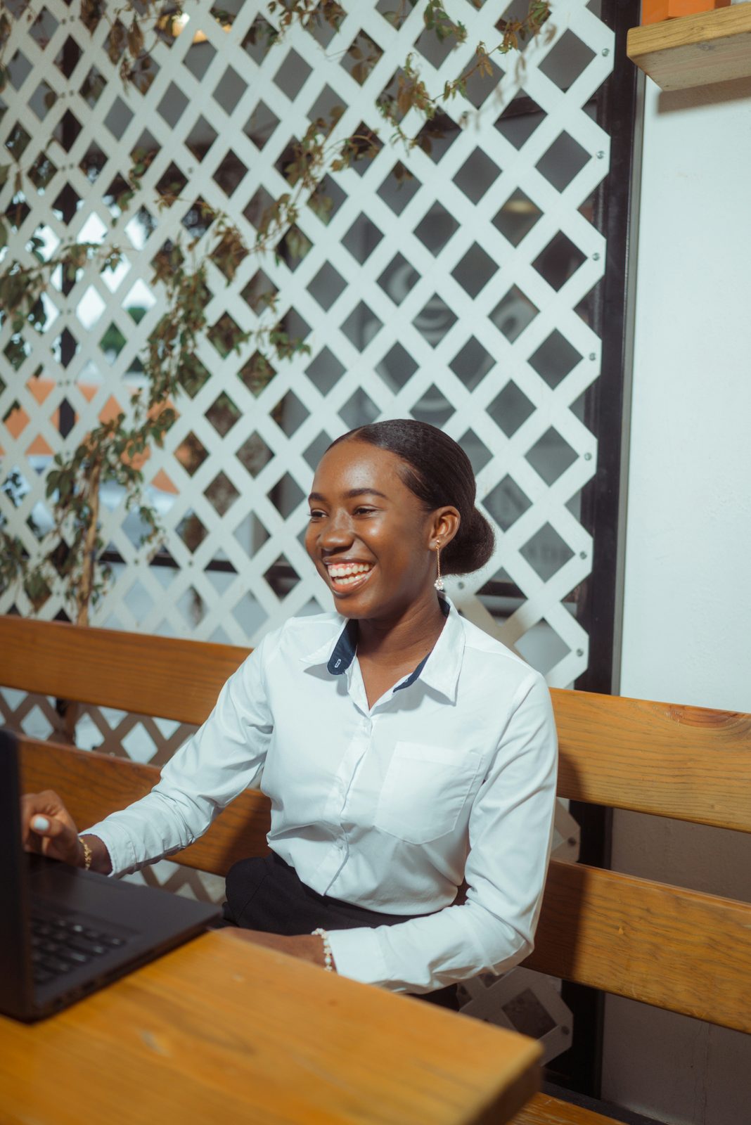Professional working through payroll on a laptop